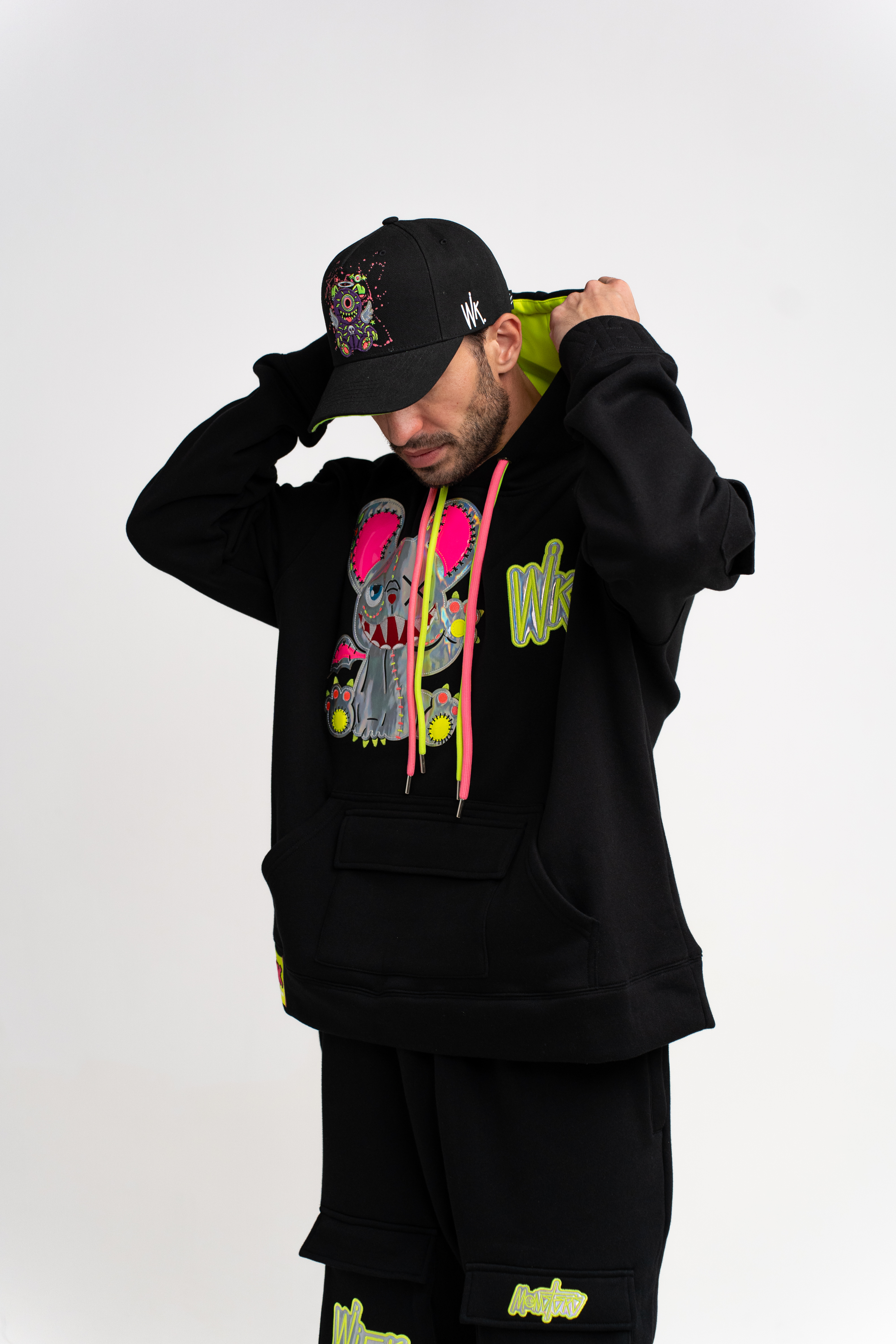 Neon ICE — black hoodie hood up